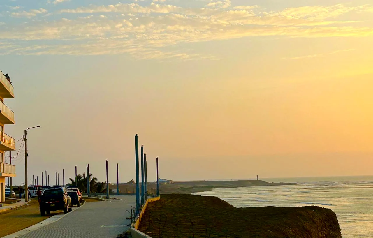 The new seafront walk by the sea, with the lighthouse at the end