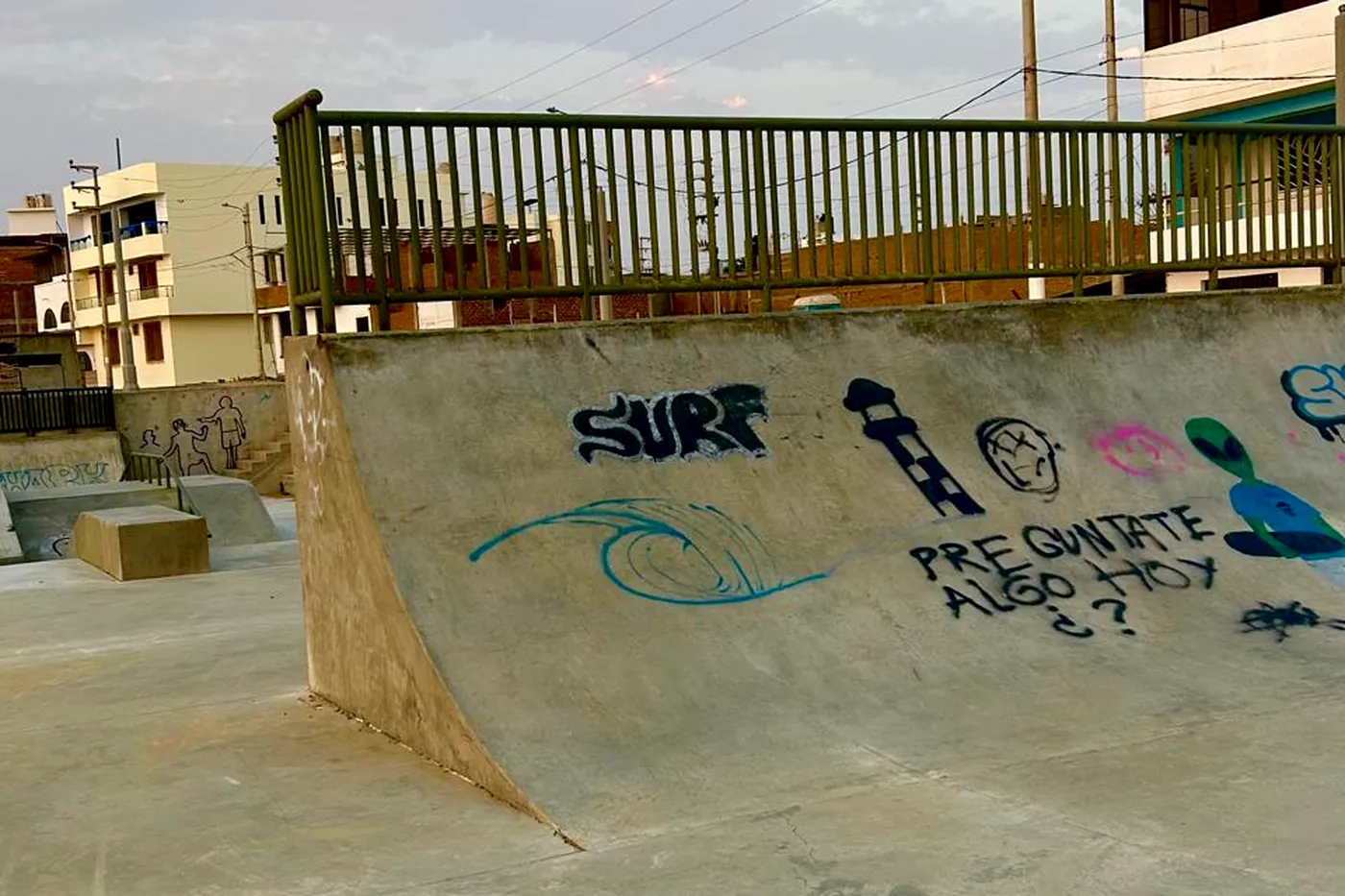 Concrete ramp of the skatepark on the new seafront, with graffiti
