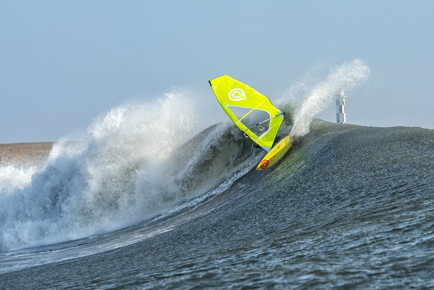 Windsurfer sailing in the bay of Pacasmayo with the afternoon wind