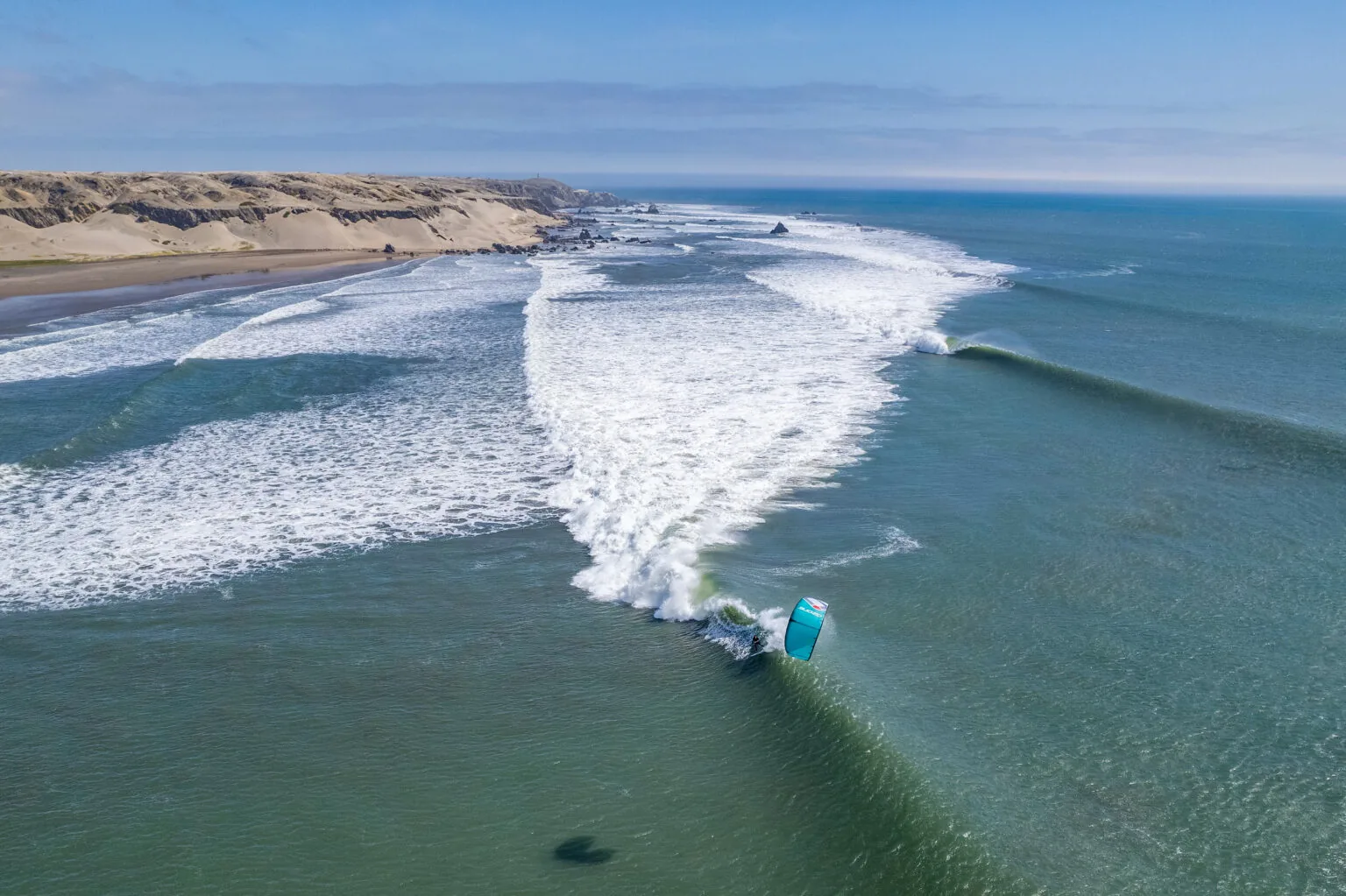 Kitesurfer jumping in front of the Pacasmayo beach
